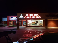 Thatcher Woods Currency Exchange 01