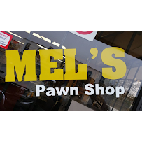 Mel's Exchange & Pawn Inc 03