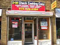 A & M Check Cashing Corp 01